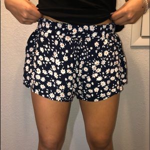Flowy summer shorts with white flowers